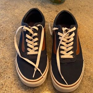 VANS navy canvas with brown leather type emblem and Vans tag.  New condition